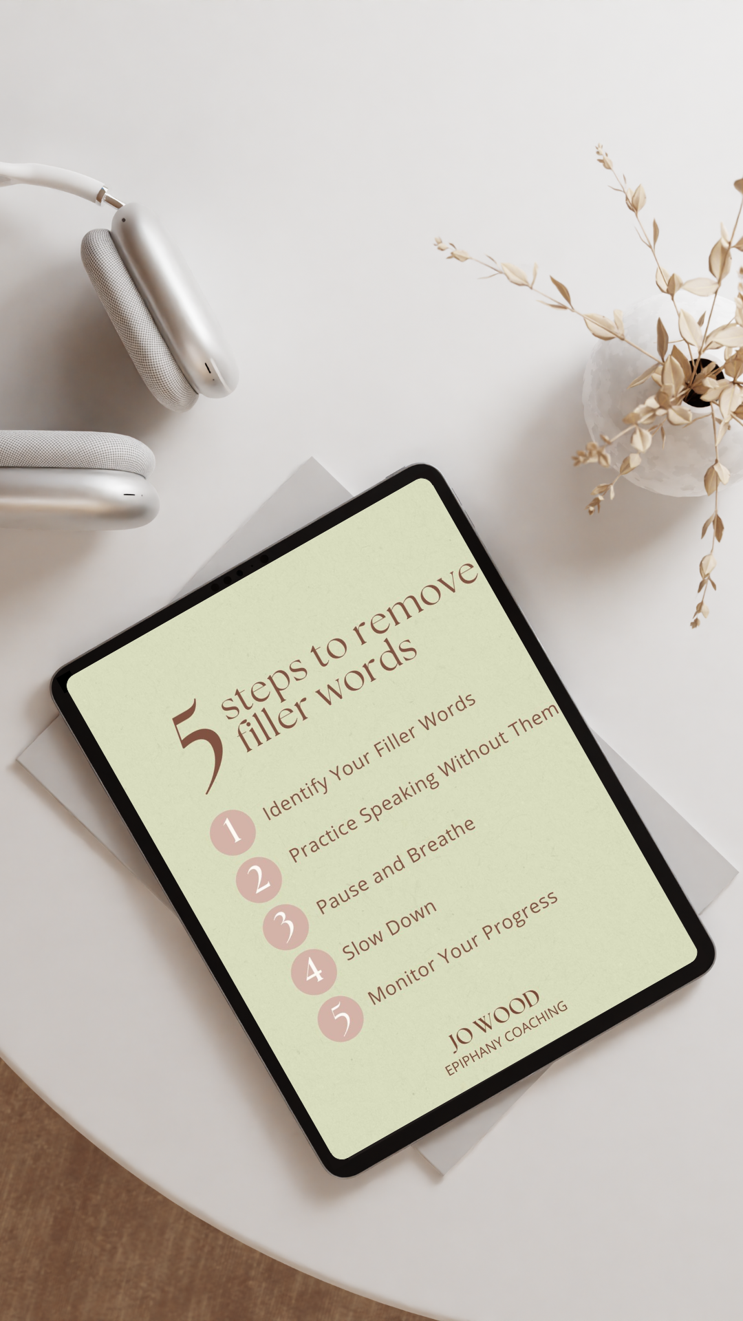 Ipad on desk with 5 steps to remove filler words